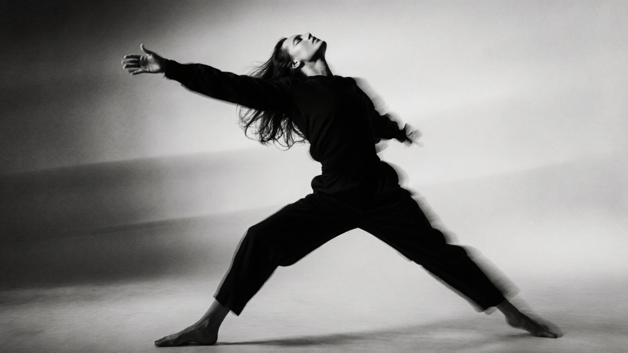 Model in motion with arms extended and head tilted back, caught in a moment of emotional flow.